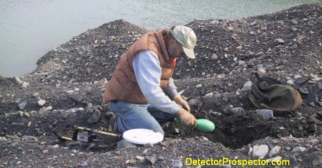 Bud excavating a target - is it a bullet or a gold nugget?