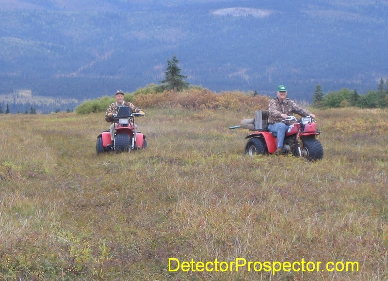 Using Honda 3-wheelers to run supplies over hill to stuck D9 bulldozer