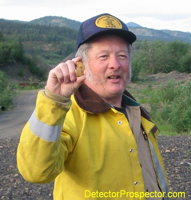 john-pulling-gold-nugget-ganes-creek.jpg